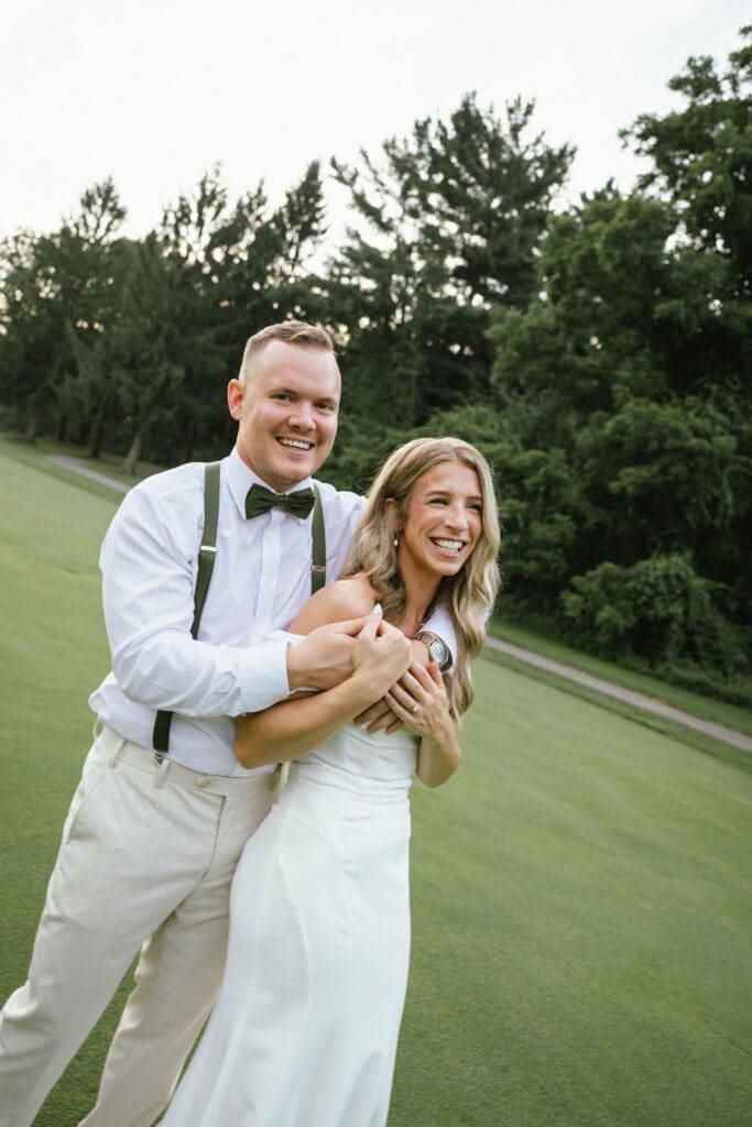 How to feel comfortable in front of the camera: Photo of a couple getting married at Pine Knob in Clarkston, Michgian