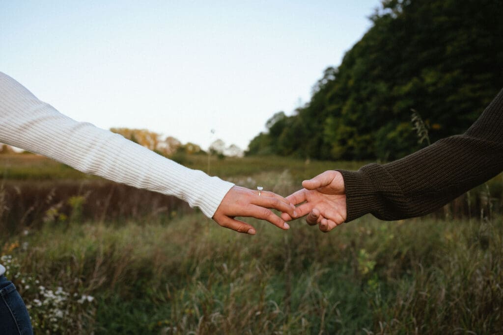 Michigan Engagement Photographer photographs a ring during session